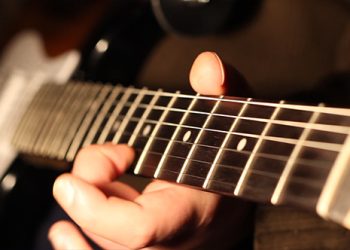 Learning to play the electric guitar